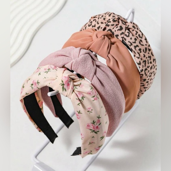 Floral and Leopard Print Headband Set along with a camel colored one. - Picture 1 of 3